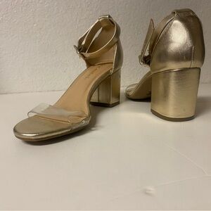Metallic gold short block Heel like new size 7 with clear strap in the front